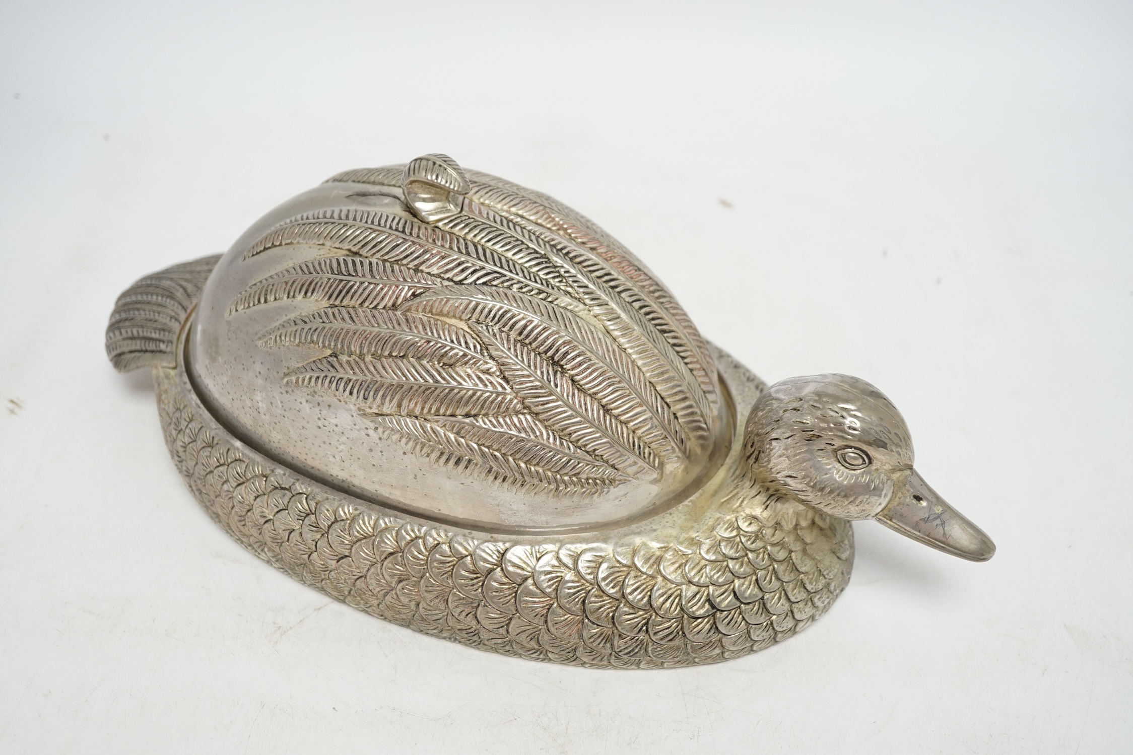 A novelty dish and cover, in the form of a duck, 37cm long. Condition - good